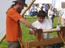 Paul and Thomas using a pole lathe