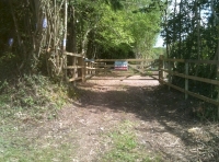 The gated entrance to the parking area