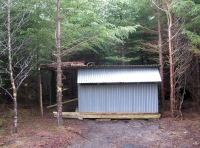 The forest store, door to the side, the front opens fully to let light in