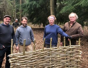 Learning to make a hurdle with hazel rods