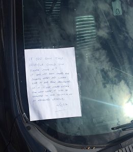 Communicating through a note on the windscreen